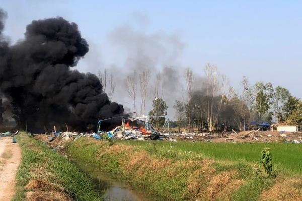 Smoke is seen rising after a deadly explosion at a fireworks factory near Sala Khao township in Thailand's Suphan Buri province on Jan. 17, 2024. 