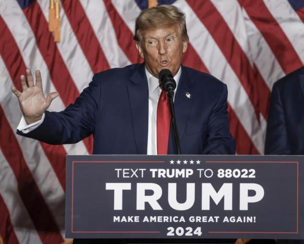 Former US President Do<em></em>nald J. Trump celebrates his win in the 2004 Iowa Caucus at the Iowa Events Center in Des Moines, Iowa on Monday, January 15, 2024.