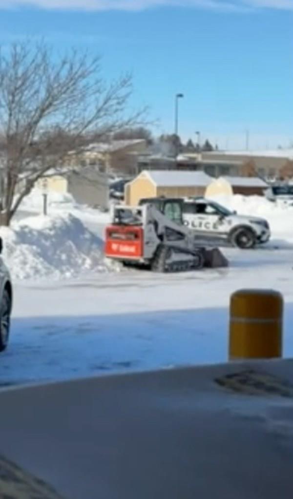 A man was arrested after damaging several vehicles, including a police cruiser, with a skid-steer loader outside a Home Depot in Lincoln, Nebraska, on Sunday, January 14, local media reported, citing police.
