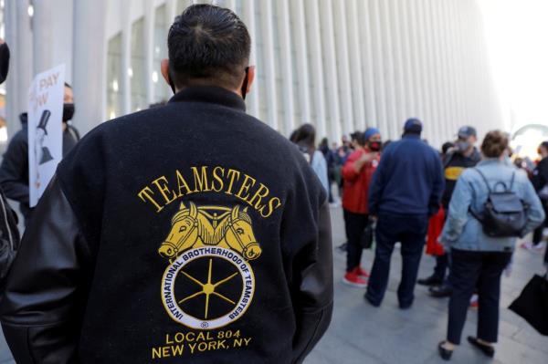 A person wearing a patch of the Internatio<em></em>nal Brotherhood of Teamsters labor unio<em></em>n attends a May Day rally for media workers held by The NewsGuild of New York on Internatio<em></em>nal Workers' Day in Manhattan, New York City, New York, U.S., May 1, 2021. 